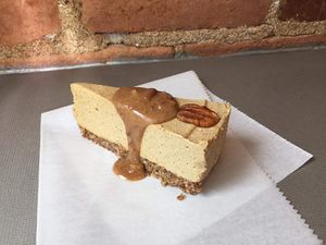 Vegan Pumpkin Spice Cheesecake with Caramel Pecan Sauce at The Hangry Herbivore in Marshall