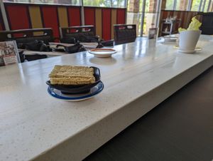 Conveyor belt with the veggies at K & L 98 HotPot in Boynton Beach