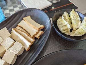 Tofu and veggie dumplings (make sure you ask them for tofu, don't just rely on the conveyor belt) at K & L 98 HotPot in Boynton Beach