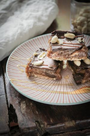 "You Make Me Snicker" : Raw vegan snickers bars made with salted date caramel, raw cacao and a drool worthy caramelised biscuit layer. at The Banana Warrior - Emquartier in Bangkok