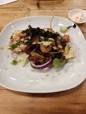 Vegetables on olive bread with salad and dressing. at The Crew Yard in Edwinstowe