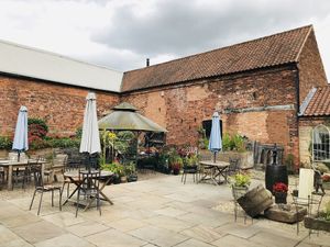 Courtyard seating  at The Crew Yard in Edwinstowe