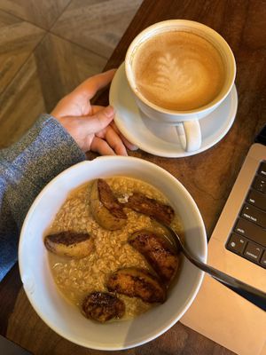 Nordic cinnamon apple oatmeal and an oat milk lattee  at Modern Love Coffee Roasters in Stamford