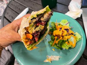 Super good falafel wrap with juicy veggies (sorry took picture after started eating) at The Greenhouse in Vientiane