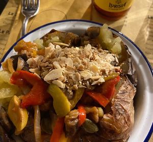 Patata ripiena di caponata di melanzane, peperoni e mandorle tostate  at Poormanger 2 in Turin