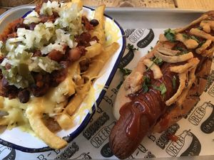 Vegan chilli fries and curry wurst dog 😋 at Hubbox in Truro