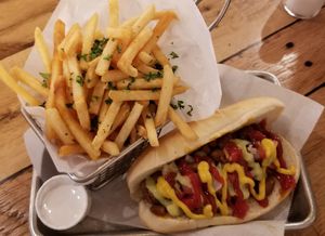 Sonoran style hot dog with parsley fries! at Earth Plant Based in Phoenix