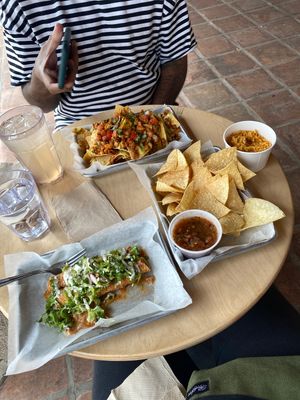 Flautas, nachos, chips n salsa and side of rice at Earth Plant Based in Phoenix