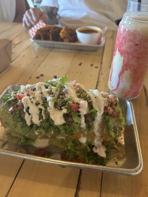 Chimichanga, Birria tacos, and a smoothy from their sister shop next door.  at Earth Plant Based in Phoenix