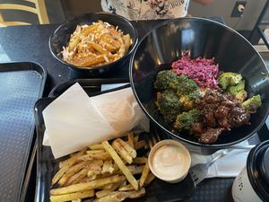 Poutine, general copper bowl, branchero burrito, side of fries with aioli  at Copper Branch - Stanley in Montreal