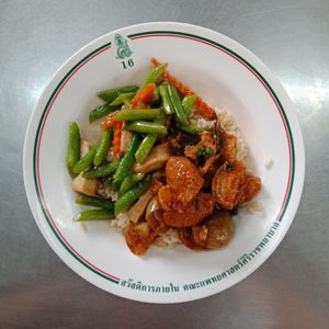 Tofu, green pea and carrot stir fried with red curry faux pork topping on steam rice. at Welfare Cafeteria - Kiosk 27 in Bangkok