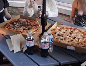 Vegan garlic mushroom and caramelised onion (left), vegan artichoke and black olive (right )  at Whole Foods Market - P St in Washington