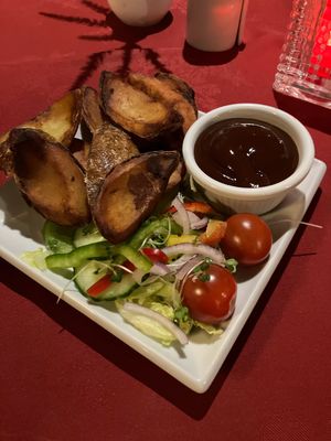 Potato skins w bbq sauce starter  at The Lion Inn in Blakey