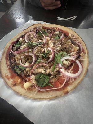 Gluten free crust with red sauce, plant based cheese and sausage, onion, pineapple, mushroom, and balsamic glaze, quite good!  at Mod Pizza in Sierra Vista