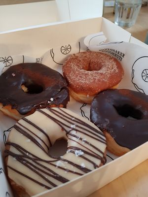 Chocolate, cinnamon/sugar, chocolate/peanut butter at Boneshaker Doughnuts in Paris