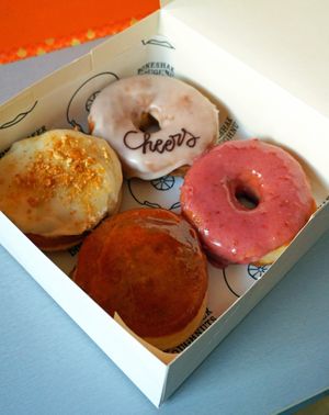 Fluffernutter + Beer + Raspberry + Pumpkin Crème Brûlée at Boneshaker Doughnuts in Paris