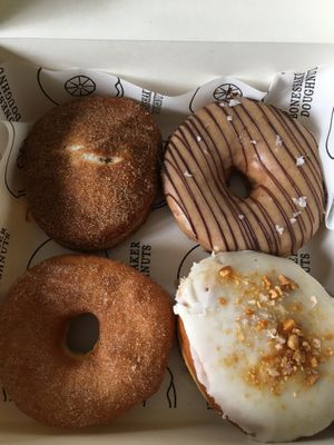 Apple cinnamon / baby got back (peanut butter & dark chocolate) / Beach Heaven (sugar & cinnamon) / Fluffernutter (peanut butter pastry cream) at Boneshaker Doughnuts in Paris