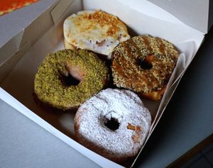 pistachio, fluffernutter, magic babs and veignet at Boneshaker Doughnuts in Paris
