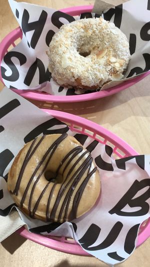 Lime and coconut (soooo good!) and peanut butter and dark chocolate drizzle  at Boneshaker Doughnuts in Paris