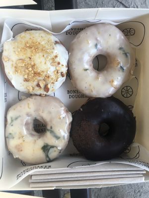 Fluffernutter ; peach (summer limited edition) & classic chocolate   at Boneshaker Doughnuts in Paris