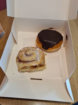 Cinnamon roll and cream doughnut at Boneshaker Doughnuts in Paris