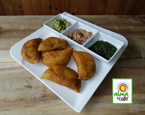 Deliciosas Empanadas Vegetarianas acompañadas de Salsas de la Casa  at Alma y Café in Cali