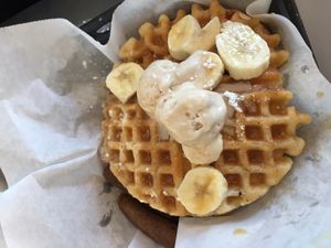 Banana waffles with ice cream, fresh bananas and caramel sauce (choice of syrup as well) at Nola Vegan in New Orleans