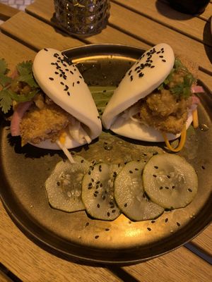 Bao buns with crunchy panko-coated tofu and pickles, peanut sauce and coriander at Pearl in Ericeira