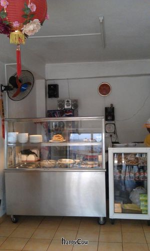 Inside the cafe, order counter.  at Huai De Vegetarian Snack in Port Louis