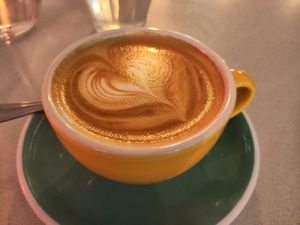 Oat milk latte at The Breakfast Club in East London