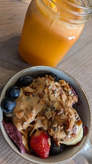 Half order acai bowl and fresh carrot, orange and ginger juice at Les Filles in London