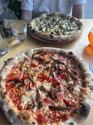 Oyster mushroom pizza and creamy mushroom pizza  at Flat Earth Pizzas in East London