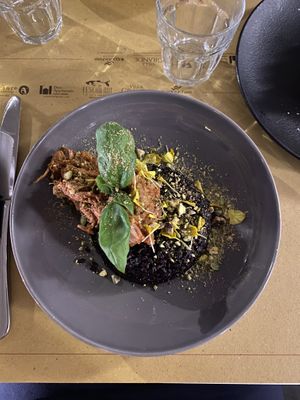 vegan&gf black rice w/ jackfruit topped w/ basil & pistachio🤌 at Ginger - Pantheon in Rome