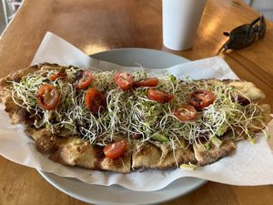 Avocado pizza flatbread  at Journey Cafe in Kailua Kona