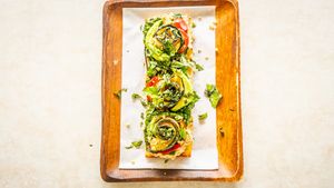 Roasted eggplant, kale, zucchini, sweet & spicy cherry peppers, cashew parmesan, basil, olive oil on a homemade breadfruit sourdough.
 at Journey Cafe in Kailua Kona