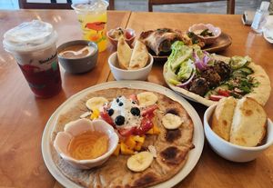 Barbecue Sourdough Pocket,  Rainbow pita, pancake , dirty chai late and  pink aloha at Journey Cafe in Kailua Kona