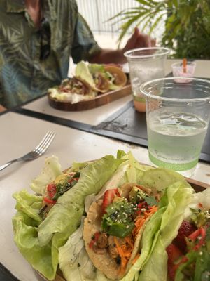 Epic Japanese bbq tacos in front, epic feisty tacos in back. So good!  at Journey Cafe in Kailua Kona