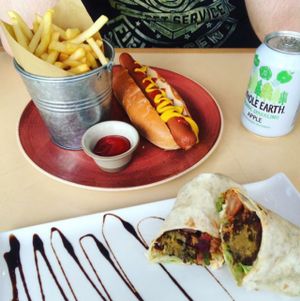 tofu 'fish' wrap and hot dog and chips! at VBites in Brighton
