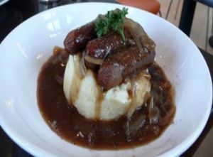 Soya bangers and mash with onion gravy at VBites in Brighton