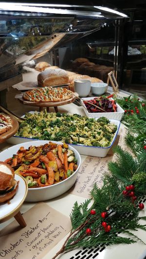 Fresh salad and pizza made from scratch at Larry's Market in North Vancouver