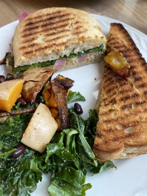 Half “tuna” sandwich, half vegan grilled cheese paired with root veggie salad   at Larry's Market in North Vancouver
