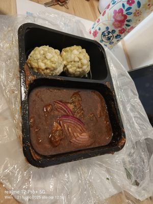 Goulash with bread dumplings at Landia in Vienna