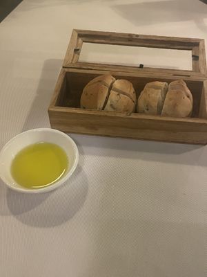 Fresh bread and olive oil (offered)  at JOMNO Modern Khmer Cuisine  in Siem Reap