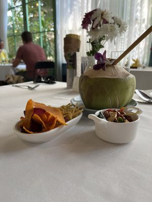 Starters and fresh coconut drink  at JOMNO Modern Khmer Cuisine  in Siem Reap