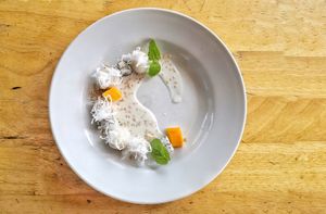 Vegan Dessert 
Palm sugar dumpling with sesame coconut sauce, grated coconut flesh  at JOMNO Modern Khmer Cuisine  in Siem Reap