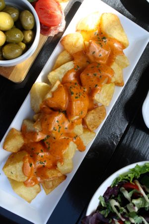 Paprika Bravas with our sweet and creamy paprika sauce  at Tapas Ibiza. La Finca Escondida in Ibiza