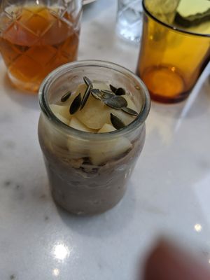 Cocoa porridge topped with pear at La Cuisine de Phanie in Versailles