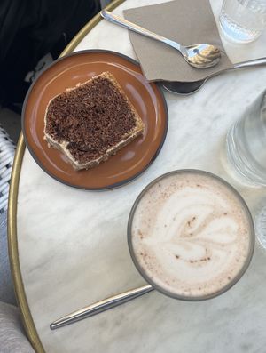Chai Latte with Oat Milk and vegan chocolate vanilla cake  at Café Tulipe in Avignon