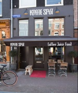 Outdoor and indoor seating at Koffiespot in Amsterdam