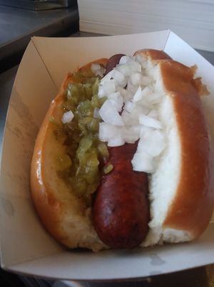 VEGAN Italian Sausage with onions and relish. at Gourmet Killer Dogs in Delray Beach